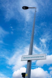 Lantern against a blue sky with sign Transport Ministry, Berlin, Germany, Europe