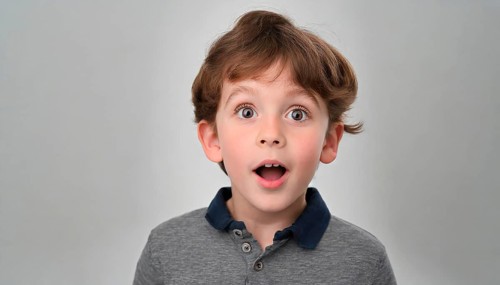 A little boy, about 9 years old, marvelling with his eyes and mouth wide open, generates AI