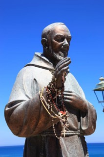 Castellammare del Golfo, statue of Padre Pio of Pietrelcina with prayer chains on his right hand,