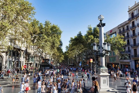 Crowd in summer, pedestrians and tourists in pedestrian zone La Rambla, Ramblas, old town,