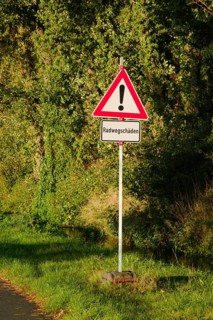 Cycle path damage, traffic sign, general danger zone, Emsland, Lower Saxony, Germany, Europe