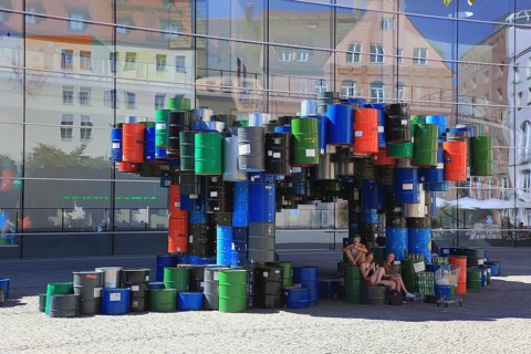 In the historic centre of Nuremberg, art with barrels in front of the Neues Museum Nuremberg, State