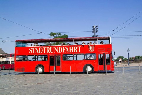 Numerous companies offer city tours in Dresden with a wide variety of vehicles, here the red