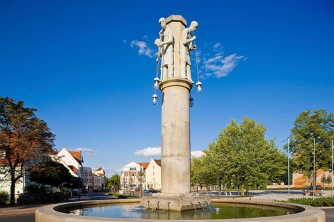 Weißwasser's old town centre with glassmaking fountain. The city of glass and ice sports. Nestled