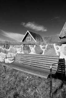 Park bench, bench, wooden bench in front of a wooden house in Karlskrona, Sweden, Europe