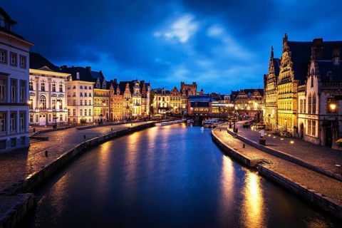 Ghent canal, Graslei and Korenlei streets in the evening. Ghent, Belgium, Europe