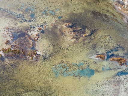 Conspicuous patterns at the bottom of the shallow lagoon Salinas de Cerrillos, aerial view, drone