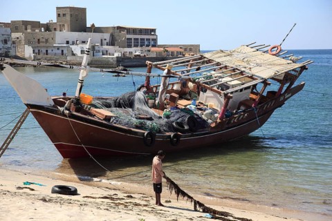 Dhow in the old fishing harbour of Mirbat in the south of Oman