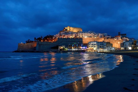 Old town with the Romanesque castle from the 14th century, blue hour, Peñíscola, province