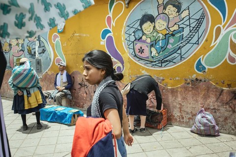 Passers-by in front of the entrance to the Sagrado Corazon de Jesus school, Avenida Ferrocarril,