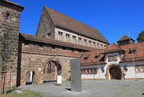 In the historic centre of Nuremberg, the Carthusian Gate, behind it the building of the Germanic