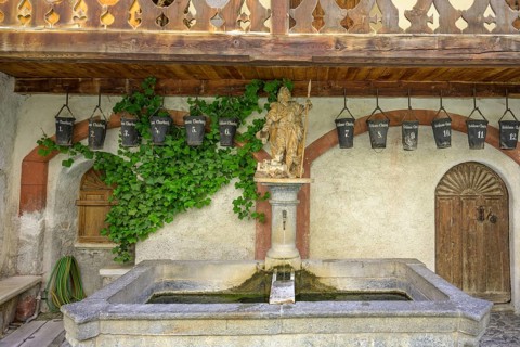 Water basin and fire bucket with statue of St Christopher, Churburg Castle, Schluderns, South