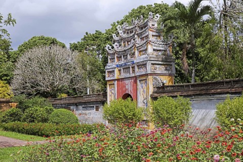 Colourful gate to the To Mieu and Hung To Mieu temple in the Imperial City located within the