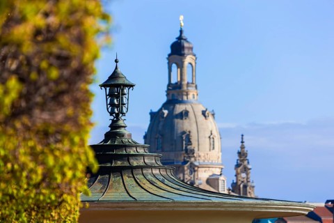 Dresden Glockenspiel Pavilion on the banks of the Elbe in Neustadt with a view of the Church of Our