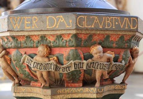 Baptismal font from 1539 with relief of a children's round dance by J¸rg Diener, in the church of