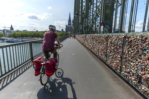 Cycling from a first-person perspective on a shared footpath and cycle path over the Hohenzollern