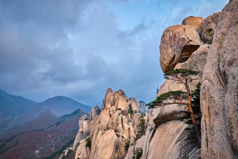 View of stone and rock formations from Ulsanbawi rock peak in stormy weather. Seoraksan National