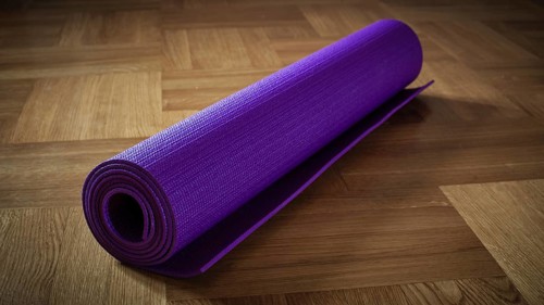 Yoga background banner, panoramic image of yoga mat on wooden floor