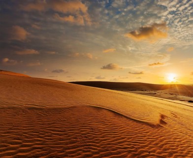 Desert sand dunes on sunrise, Mui Ne, Vietnam, Asia