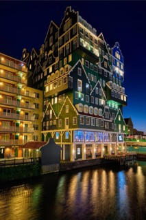ZAANDAM, NETHERLANDS, MAY 8, 2017: Inntel Hotel in Zaandam illuminated at night. Design of