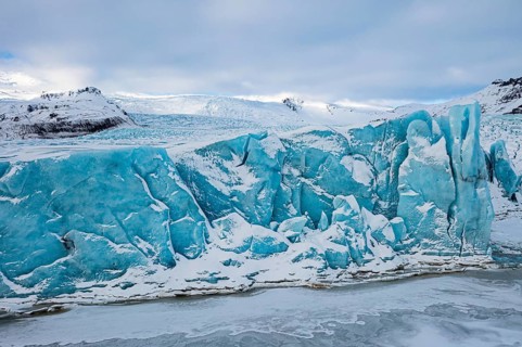 Glacier break in the Fjallsarlon glacier lagoon, drone image, Sudurland, Iceland, Europe