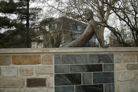 Bronze sculpture on the wall of the Erich Kästner Museum in Dresden