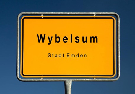Town sign for Wybelsum, a district of Emden, East Frisia, Lower Saxony, Germany, Europe