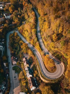 Aerial view S-curve in autumn, Calw, Black Forest Germany