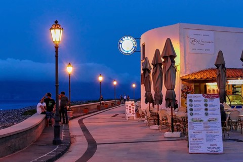 Coastal promenade, young passers-by, lanterns, night blue sky, night shots, evening mood, Lingua,