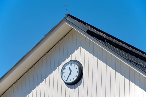 House gable, clock, sky, Lake Millstatt, Millstatt, Carinthia, Austria, Europe