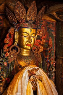 Maitreya Buddha statue close up Tibetan monastery Thiksey Gompa. Ladakh, Jammu and Kashmir, India,