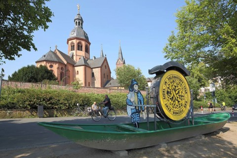 Einhard Basilica of St. Marcellinus and Peter and boat with seal on the road, cyclist, monastery