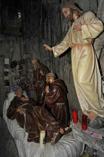 Interior of the Grotto of St Anthony of Padua, Saint-Antoine de Padoue showing praying monks at