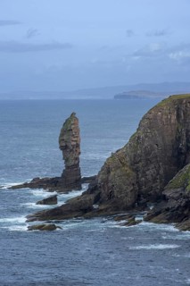 Old Man of Stoer, 60 metres high sea stack of Torridonian sandstone at the Point of Stoer in