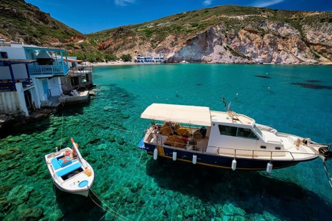 Greek village scenic picturesque view in Greece, fishing boat and fishing village of Firapotamos