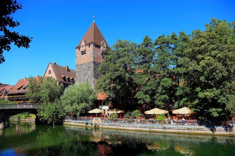 In the historic centre of Nuremberg, houses and restaurant with beer garden on the island of