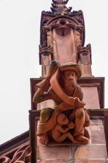 Gargoyles on the buttress of the Freiburg Cathedral, the Cathedral of Our Lady, in the old town of