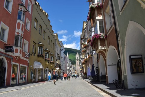 The historic old town and pedestrian zone of Sterzing with the Zwölferturm at the end, South Tyrol,