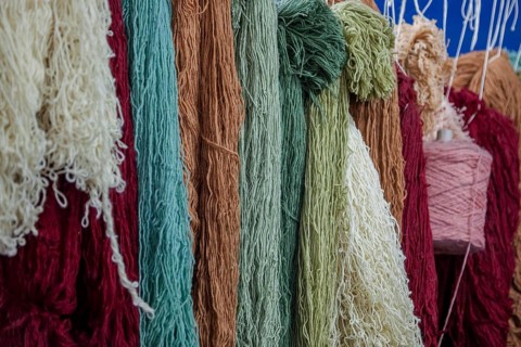 Colourful carpet yarns in a carpet factory, Turkey, Asia