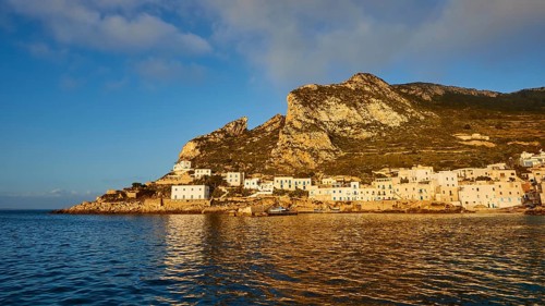 Soft morning light, hill, Levanzo town, main town, blue sky, white clouds, Levanzo, Egadi Islands,