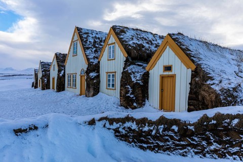 Peat huts in the snow, Glaumbaer Museum Village, Northern Iceland Vestra, Iceland, Europe