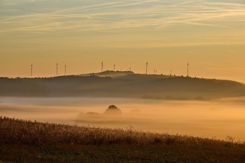 Landscape, fields, wind turbines, fog, sunrise, Höhefeld, Wertheim, Baden-Württemberg, Germany,