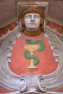 Art Nouveau figure and sign above the entrance of a pharmacy, Erlangen, Middle Franconia, Bavaria,