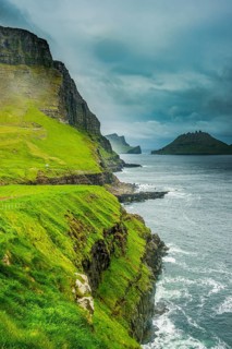 Huge cliffs in Gasadalur, Vagar, Faroe islands, Denmark, Europe