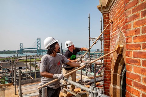 Detroit, Michigan, Anthony Powell (left) and Kevin Driscoll clean and repair the bell towers of the