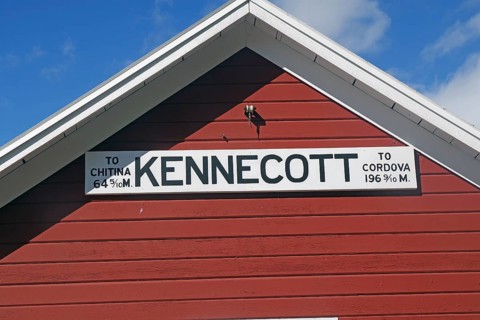 Distance in Kennecott, red wooden buildings, railway, ghost town, Unesco World Heritage