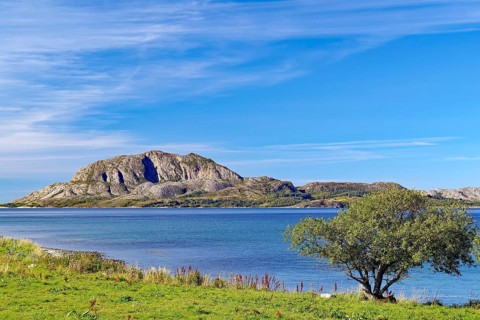 Single mountain and view of Torghatten, Bronnöysund, Kystriksveien, FV 17, Helgeland, Norway,