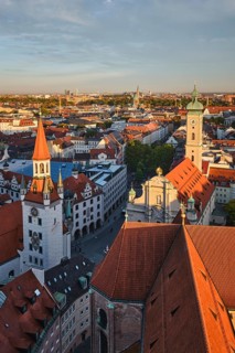 Aerial view of Munich, Marienplatz and Altes Rathaus from St. Peter's church on sunset. Munich,