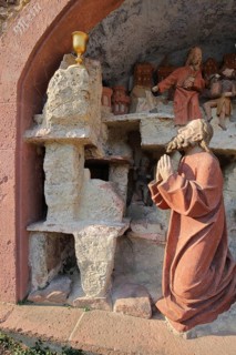 Biblical depiction and scene from the Mount of Olives with Jesus praying with chalice at the