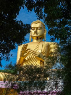Seated Buddha, golden temple, Dambulla, Sri Lanka, Asia